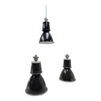 Suite of three industrial lamps.
