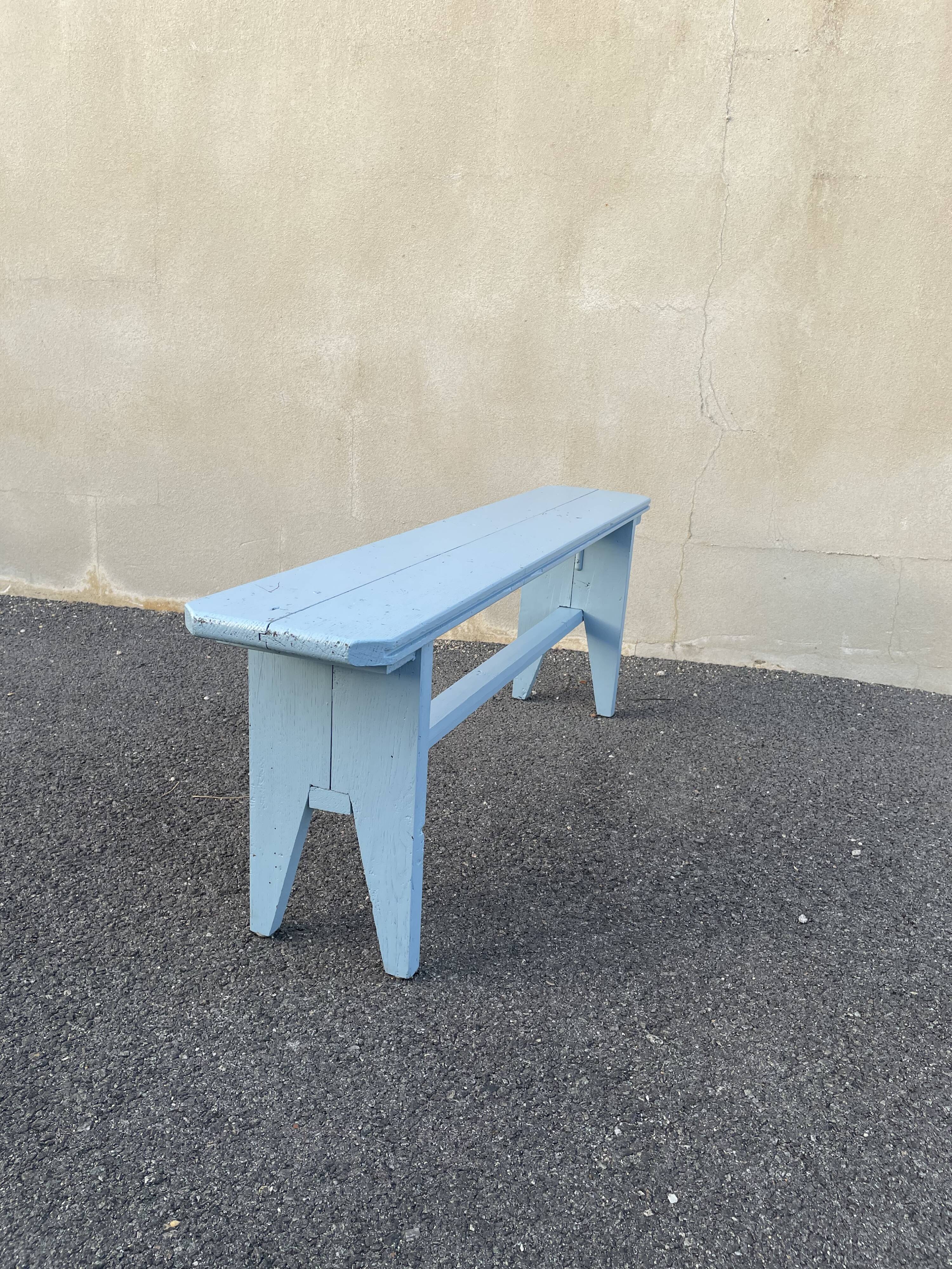 Blue painted wooden bench