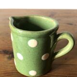 Tiny old pitcher in Savoyard earthenware, light green color with cream peas