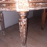 Chaise basse de style Louis XVI