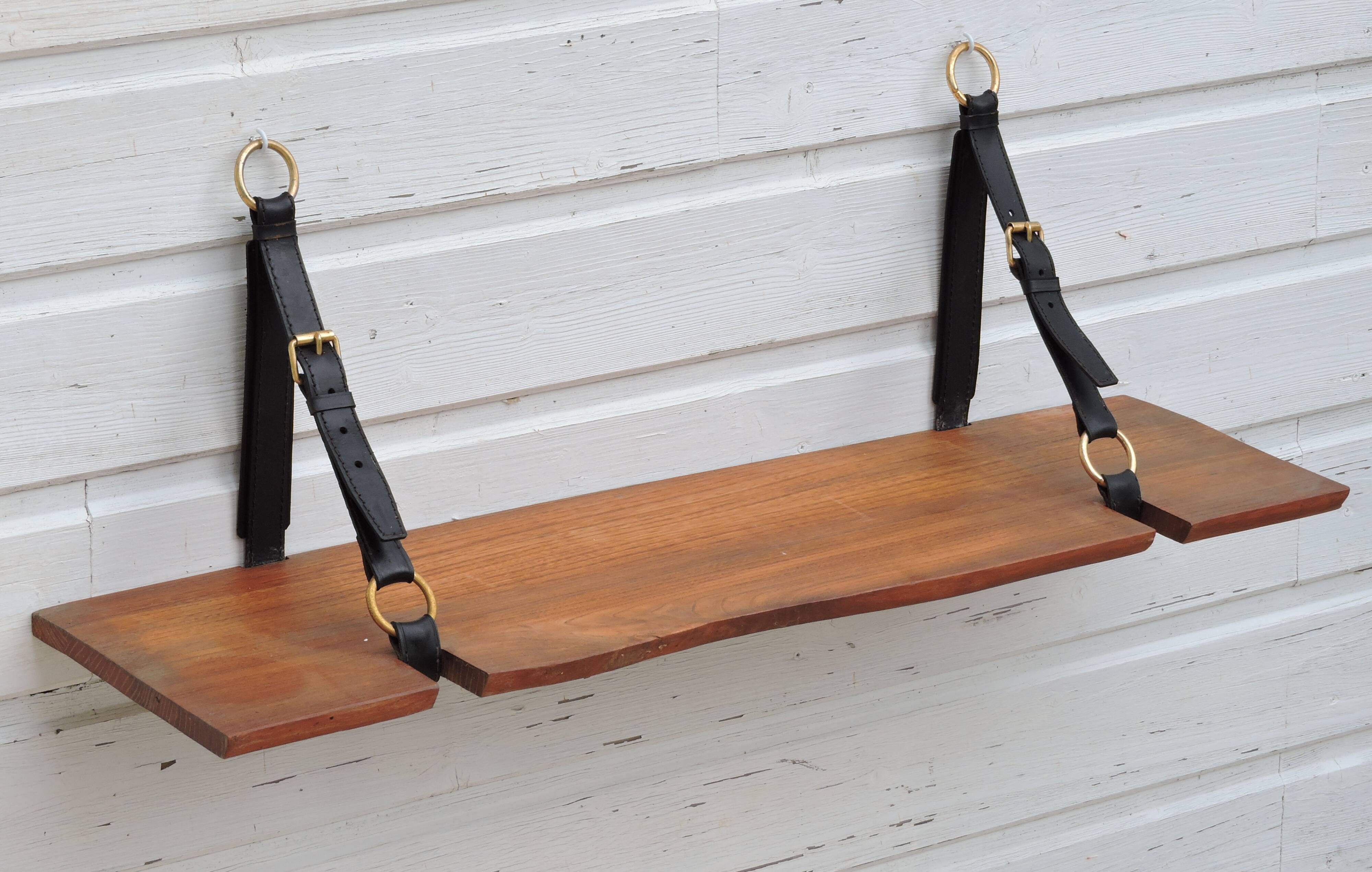 Elm and leather shelf, distributed by the Maison et Jardin Gallery in the 60