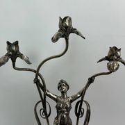 Large figurative chandelier with a femme fatale nymph.
