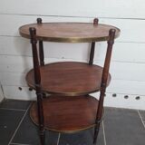 Oval mahogany side table has 3 floors