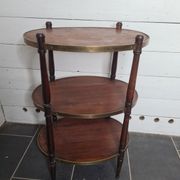 Oval mahogany side table has 3 floors
