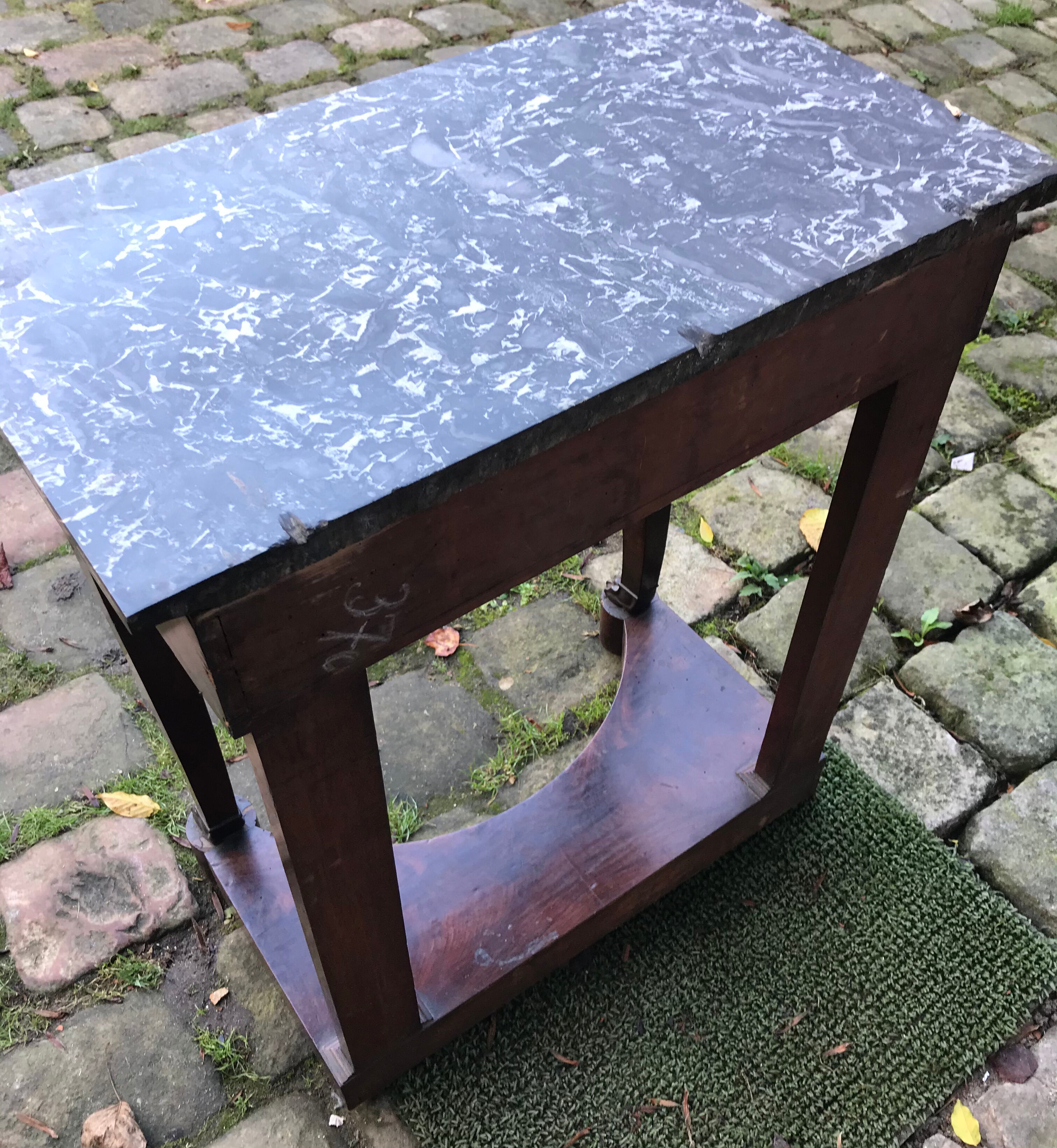 Empire-style console with marble and mahogany claws