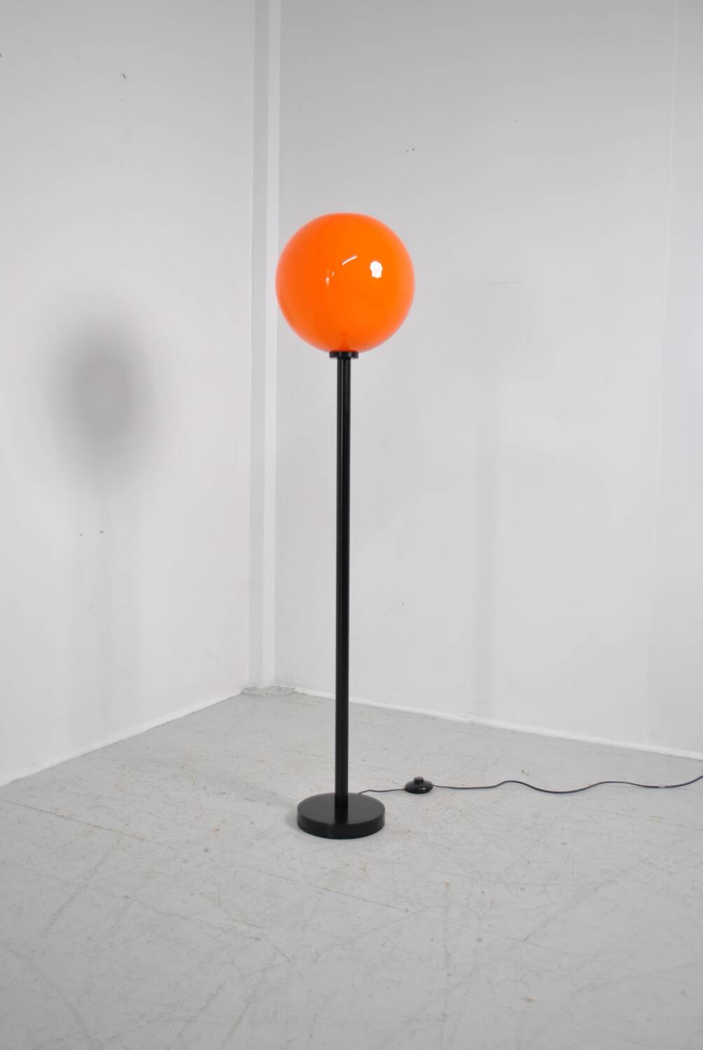 Orange globe floor lamp 1970