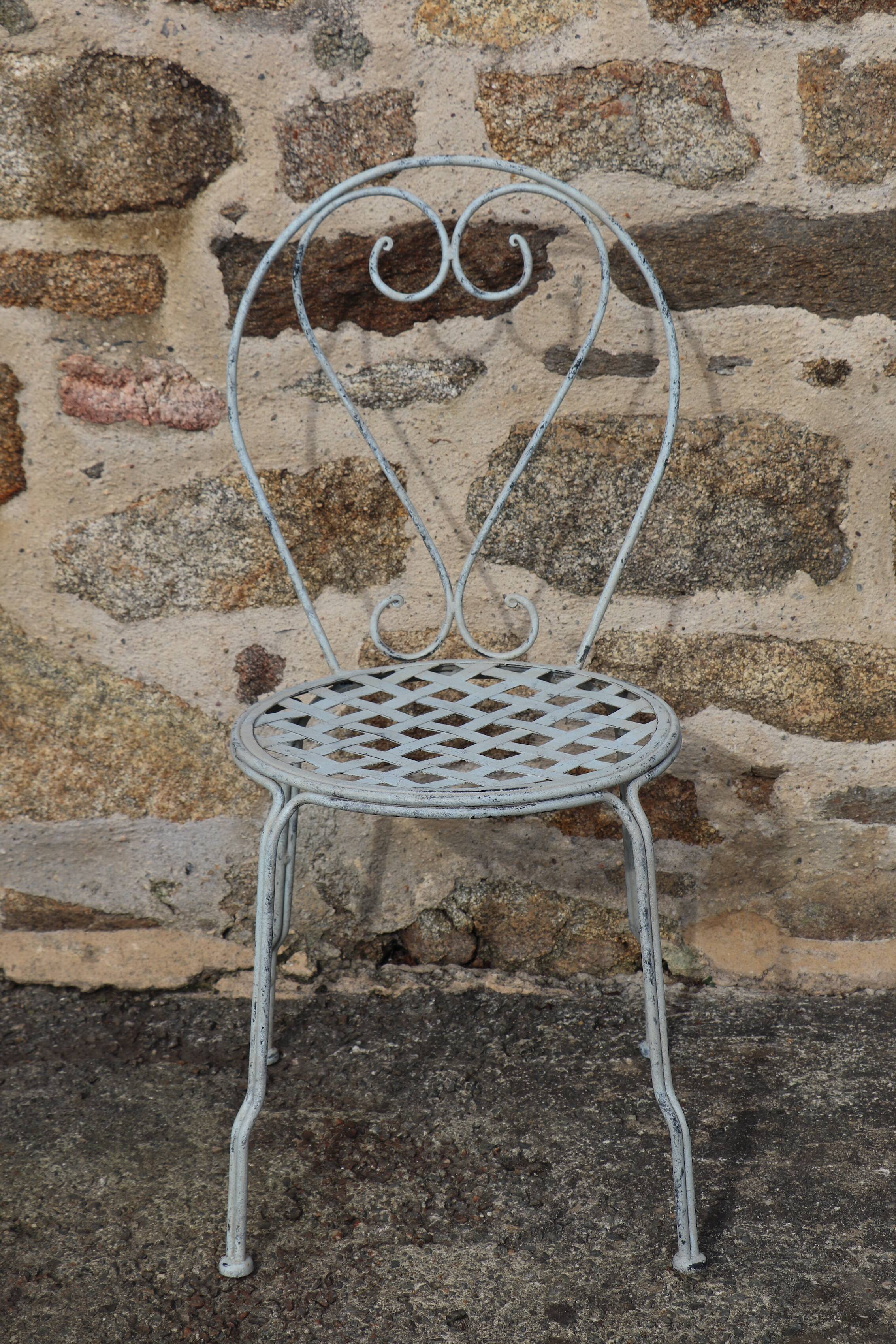 Series of 6 wrought iron garden chairs