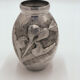 Signed metal vase