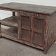Antique wooden and metal accent furniture with mesh doors
