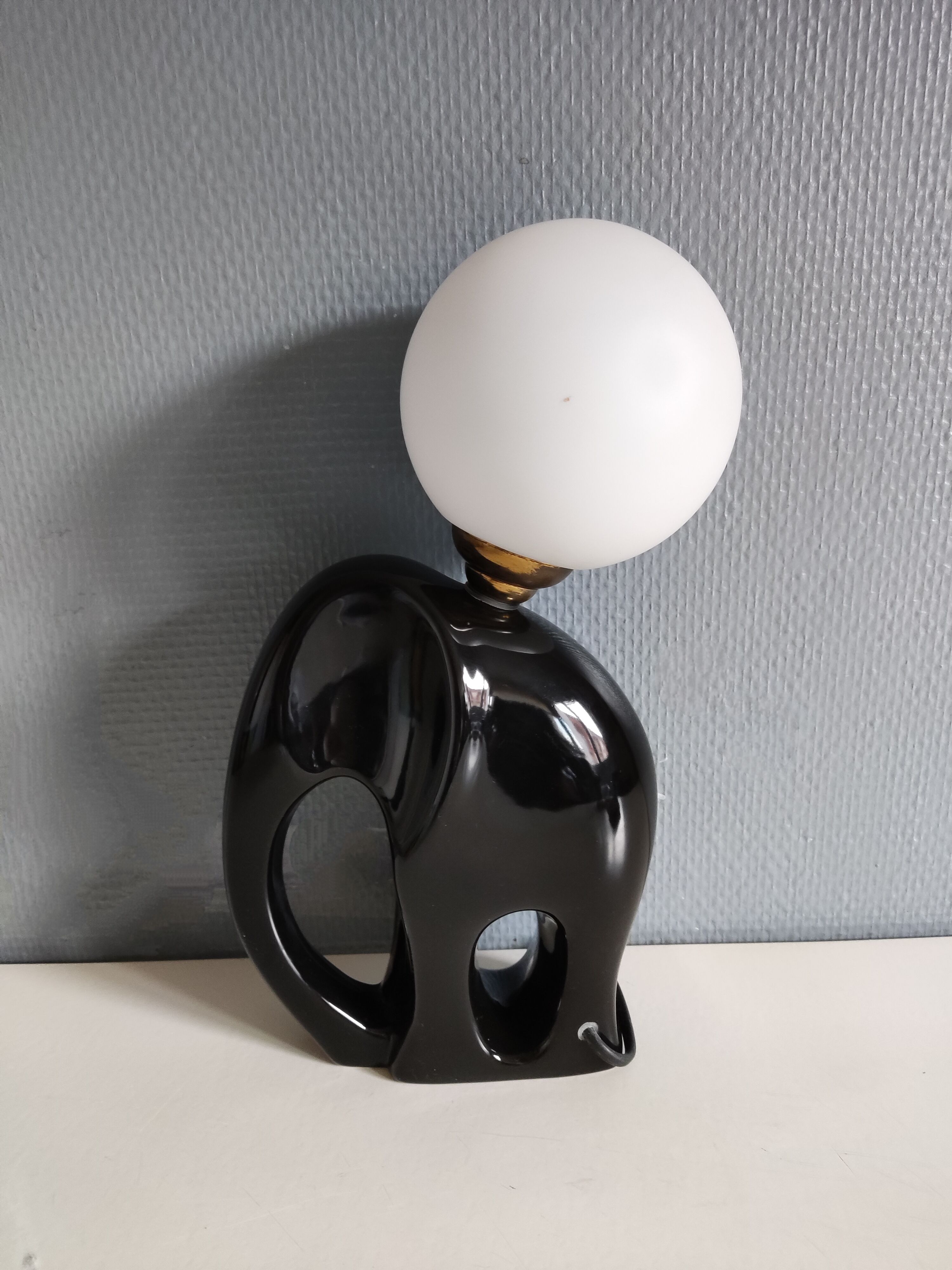 Ceramic lamp with opal globe