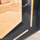 Octagonal mirror in lacquered black wood and brass - mirror smoked glass pink gold