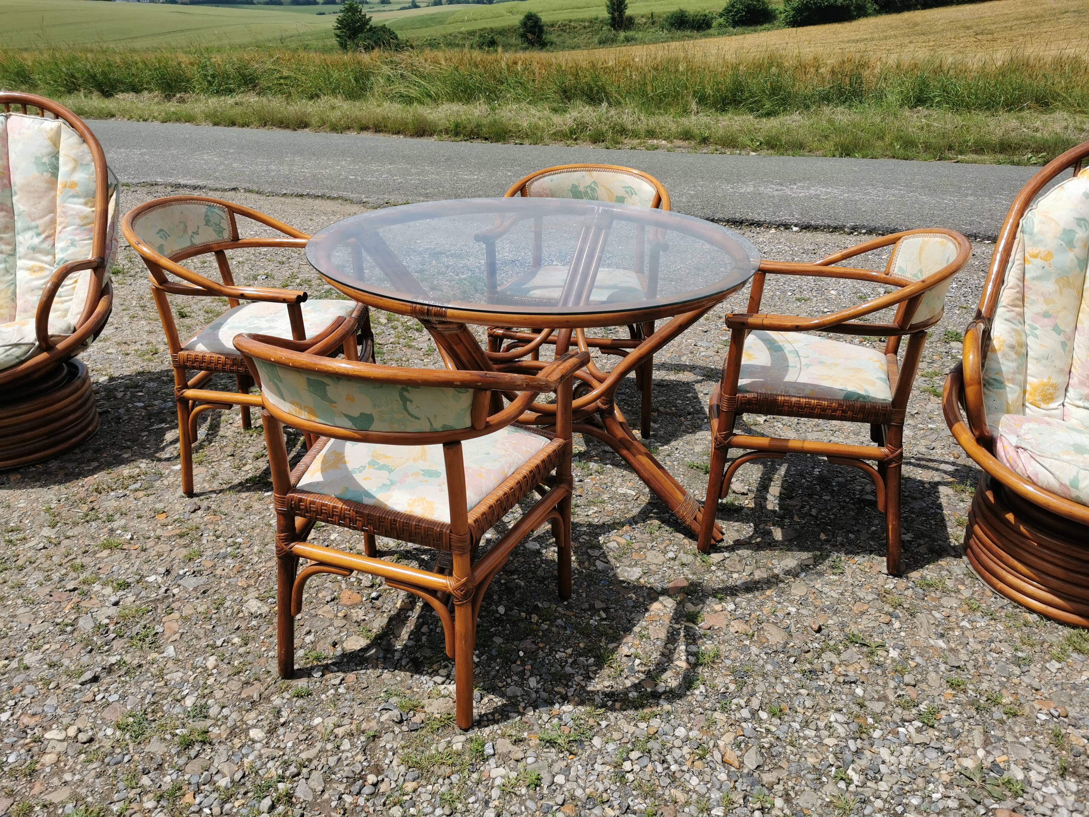 Rattan garden furniture, table, chairs and armchairs
