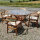 Rattan garden furniture, table, chairs and armchairs