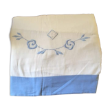 Embroidered cotton linen sheet with blue border