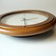 Horloge murale encadrée en bois faite par Junghans vintage