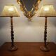 Pair of tall turned wooden lamps