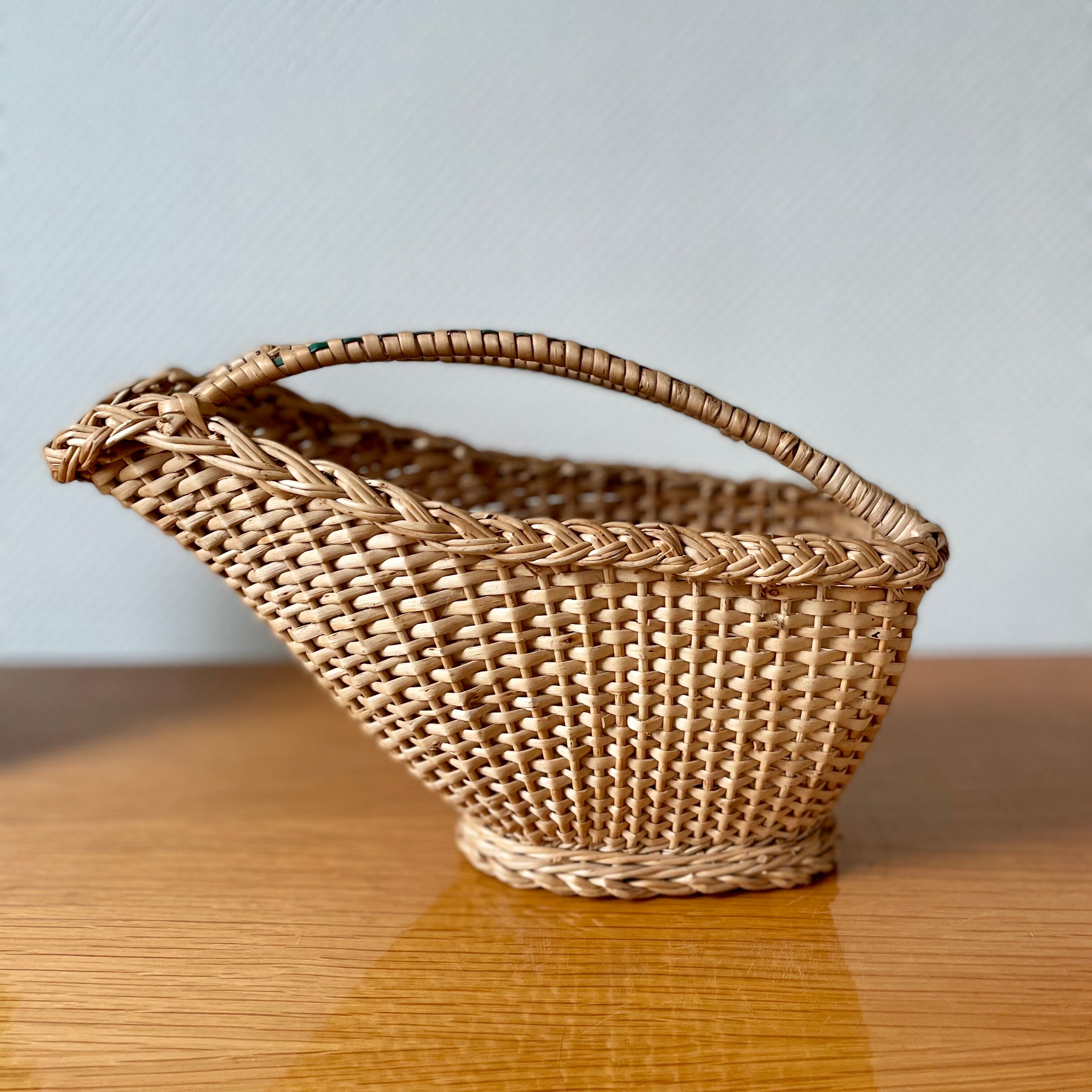 Old rattan pouring basket
