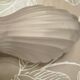 Art Deco wall sconce in frosted pink glass with a seashell design