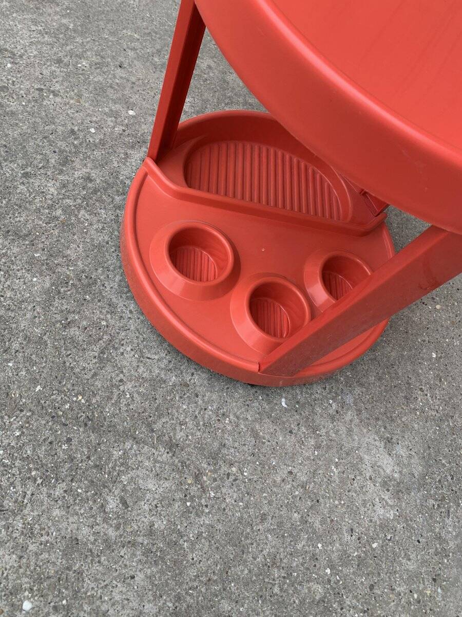 Round red bar cart in injected plastic, Mid-Century Italian style, 1970s.