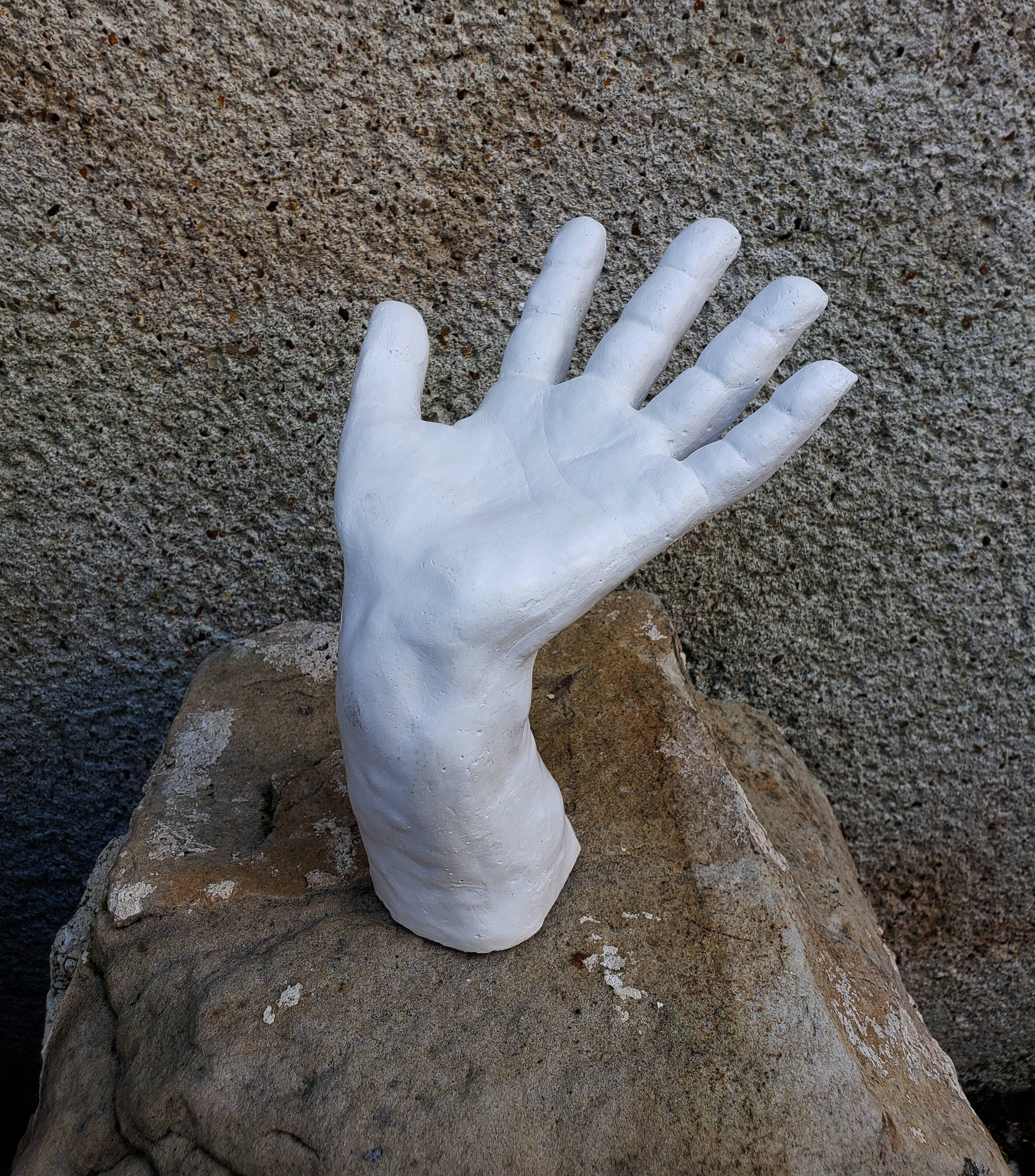 Plaster hand