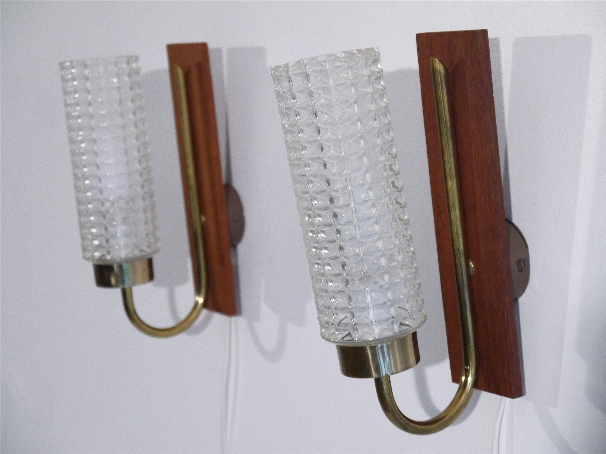 Pair of Scandinavian vintage teak and glass appliques