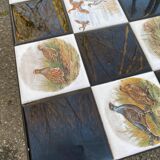 Vintage coffee table with black wrought iron and white tiles.