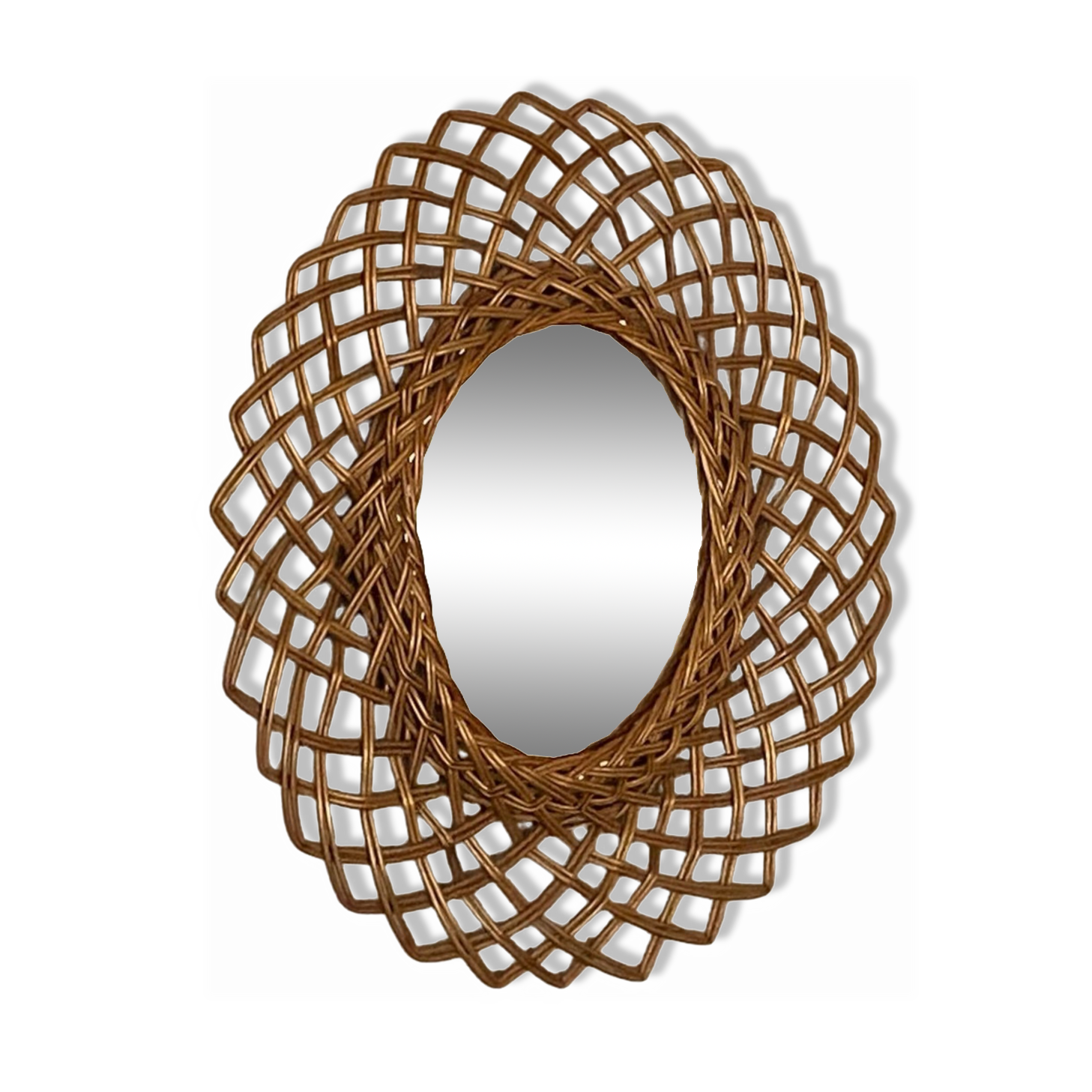 Sun mirror in woven rattan. 1960.