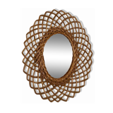 Sun mirror in woven rattan. 1960.