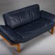 Danish teak and navy blue leather 2-seater sofa from Komfort, 1970s