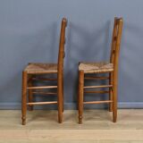 Pair of rush-seated chairs in cherry wood – late 19th century