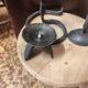 Set of 3 candlesticks and a candle holder in wrought iron.