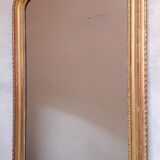 Golden mirror with pediment XIXth