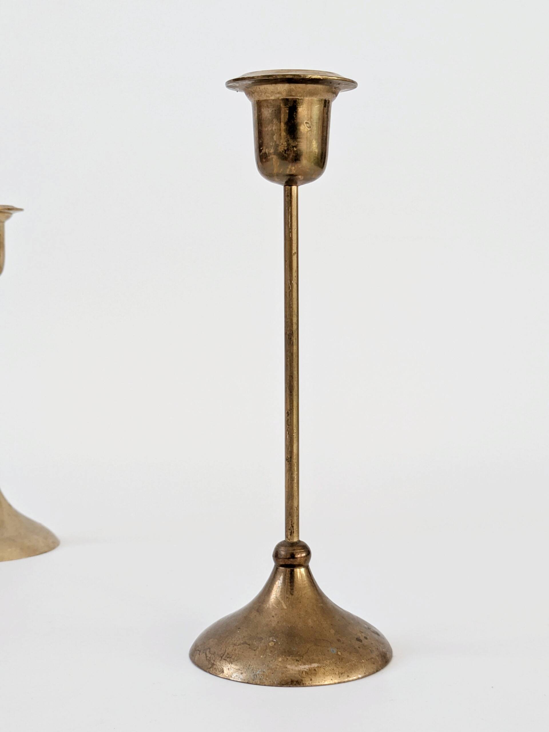 Pair of mid-century vintage brass candlesticks