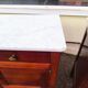 Set of 2 wooden and marble bedside tables.