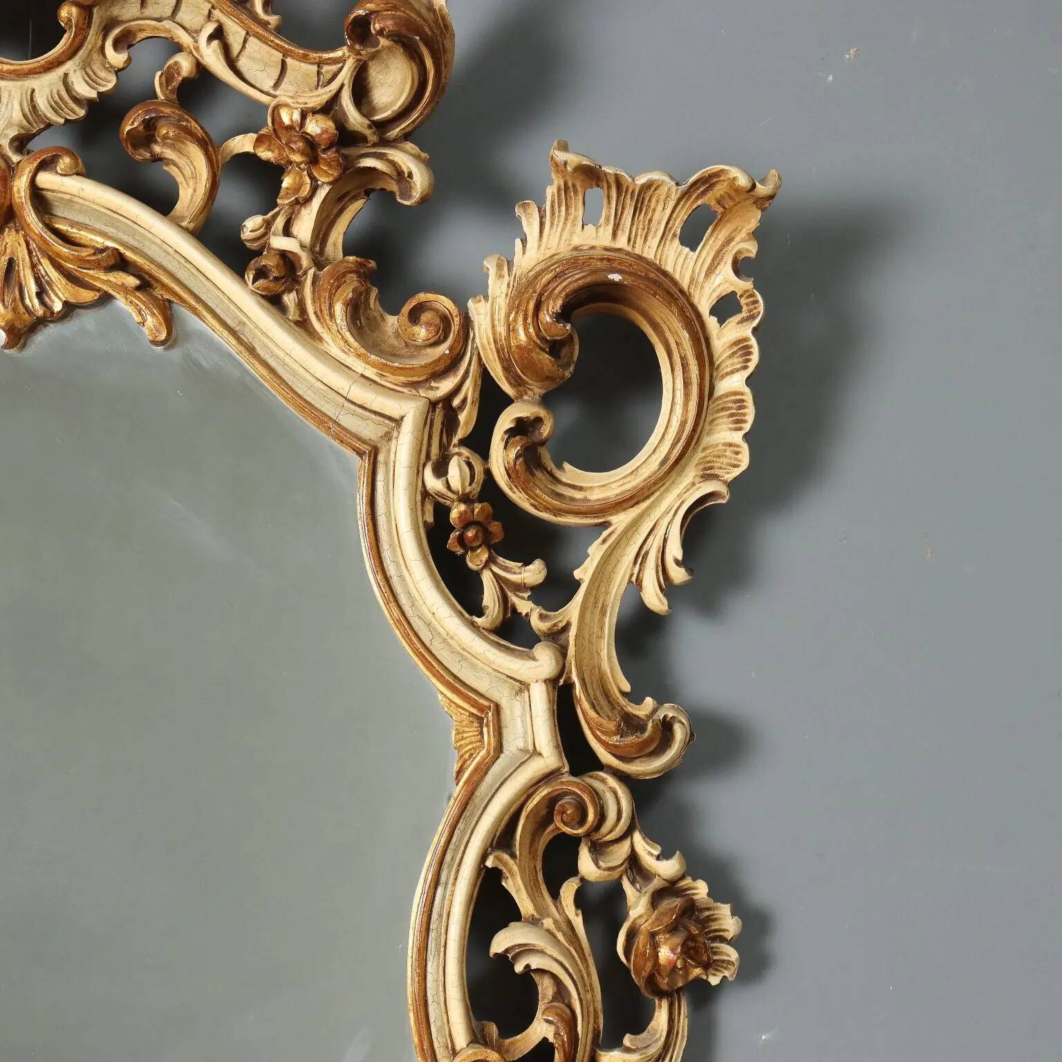 Antique lacquered and gilded wooden mirror, Italy, early 20th century.