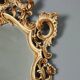 Antique lacquered and gilded wooden mirror, Italy, early 20th century.
