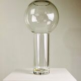 A modernist vase in clear glass.