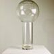 A modernist vase in clear glass.