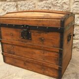 Ancient travel trunk, bulging wooden chest