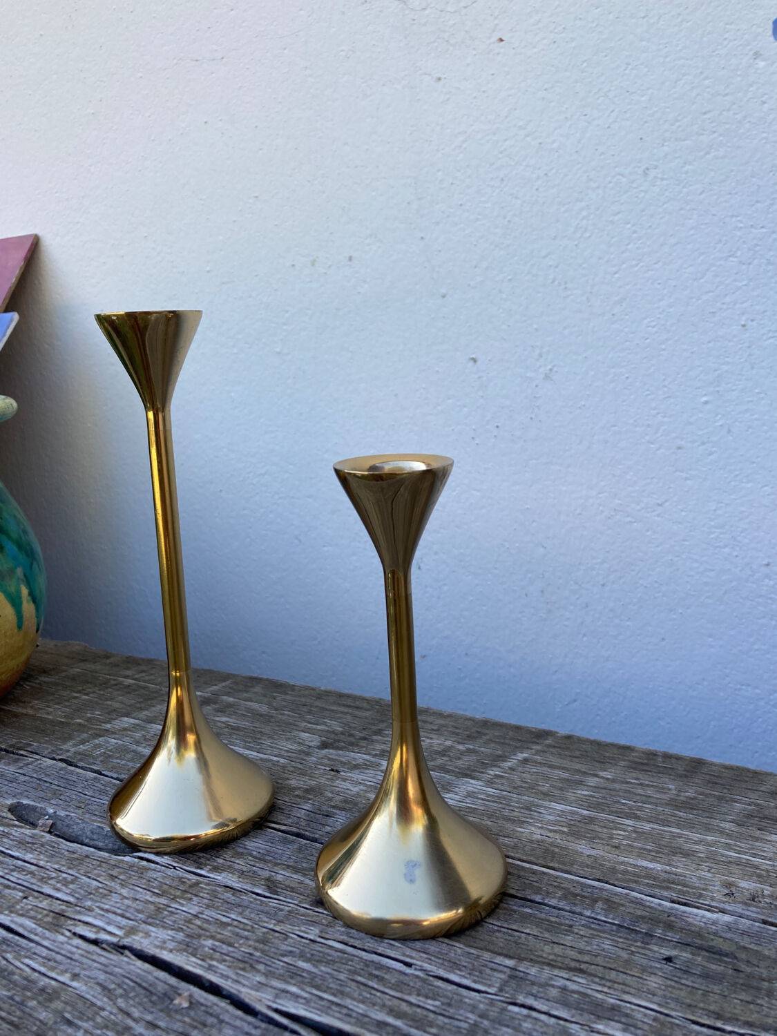 Duo of Scandinavian candle holders in gilded brass