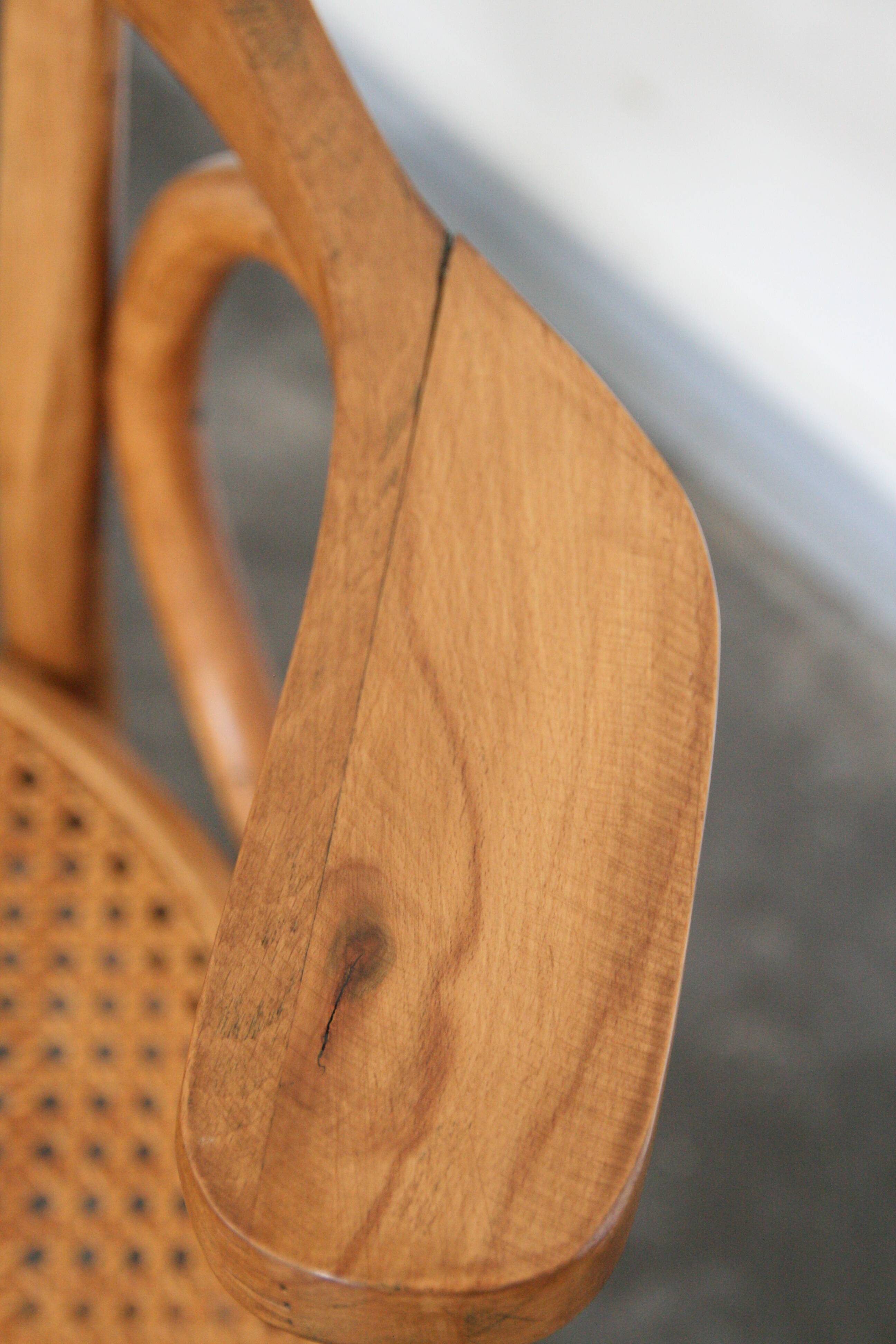 A pair of vintage bent wood svivel chairs by Salvaatore Leone Italy