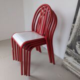 Set of 4 modernist red metal chairs