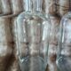 2 large antique transparent glass bottles