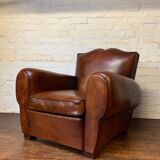 Fauteuil club en cuir français modèle havana moustache avec accoudoirs en forme de cigare cubain vers 1950