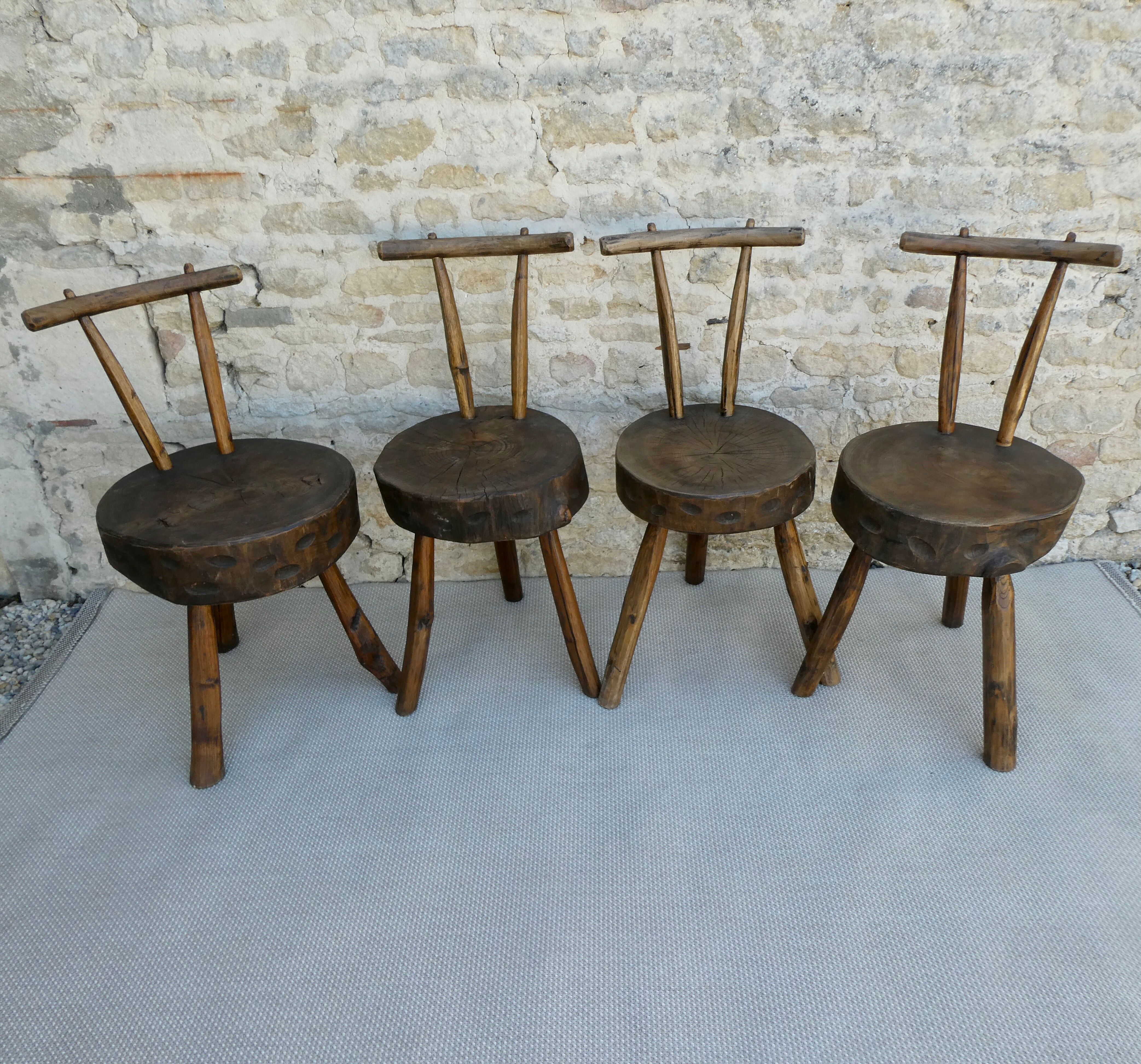 Suite of 4 tripod chairs, trunk seats, solid wood