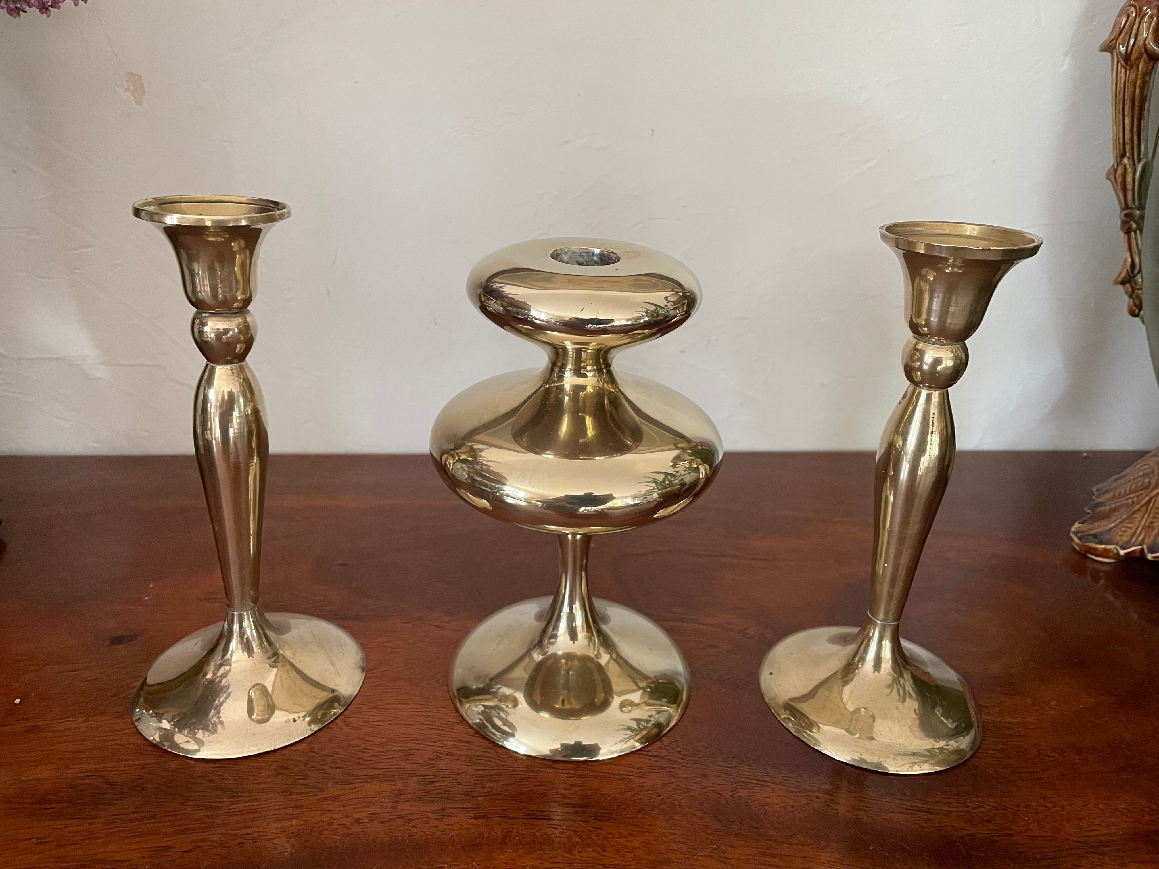 Three vintage brass candle holders