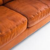 Three-seater sofa in cognac-colored leather produced by De Sede. Model DS-17/123, Switzerland, 2000s