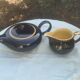 Teapot and milk jug We Two in vintage black and yellow ceramic