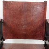 “Safari” armchair in wood and cognac leather. 1960s/70s.