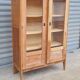 Armoire pied compas en chêne blond